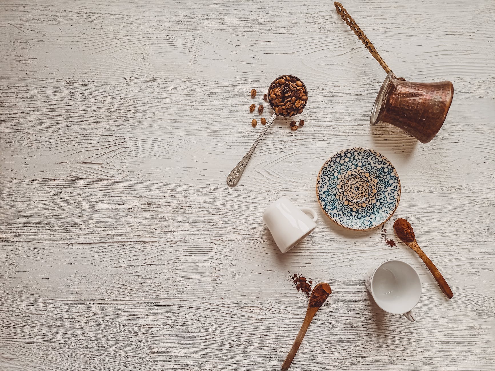 ceramic mugs and wooden spoons