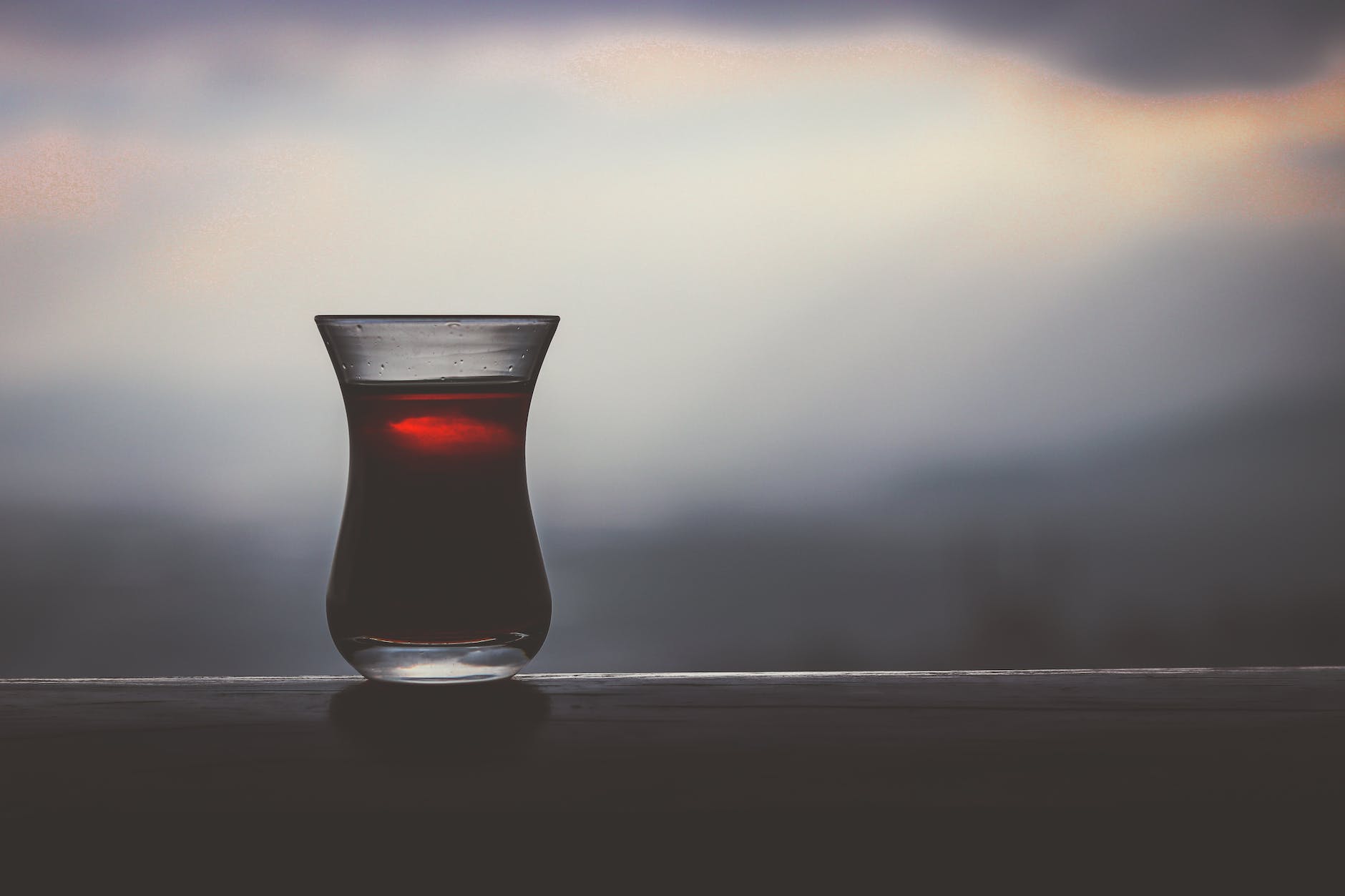 close up photo of filled turkish tea glass